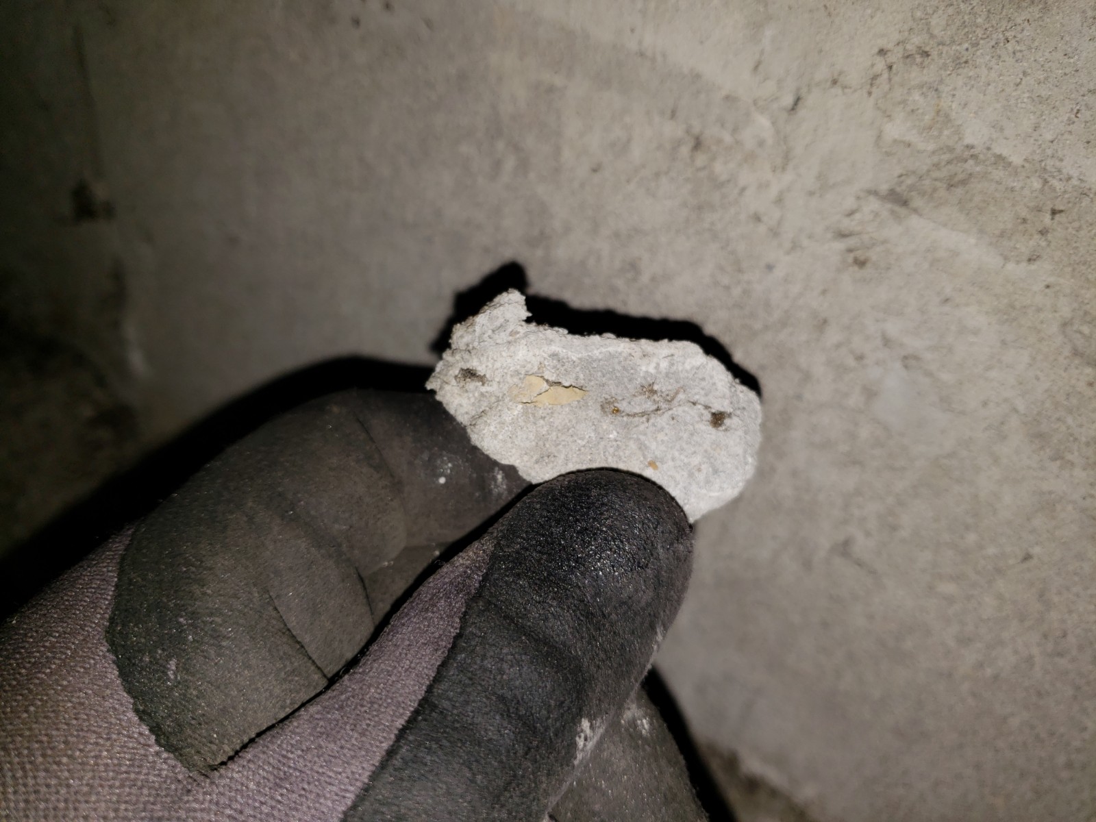 concrete pieces in ductwork of the mechanical ventilation system of a carpark